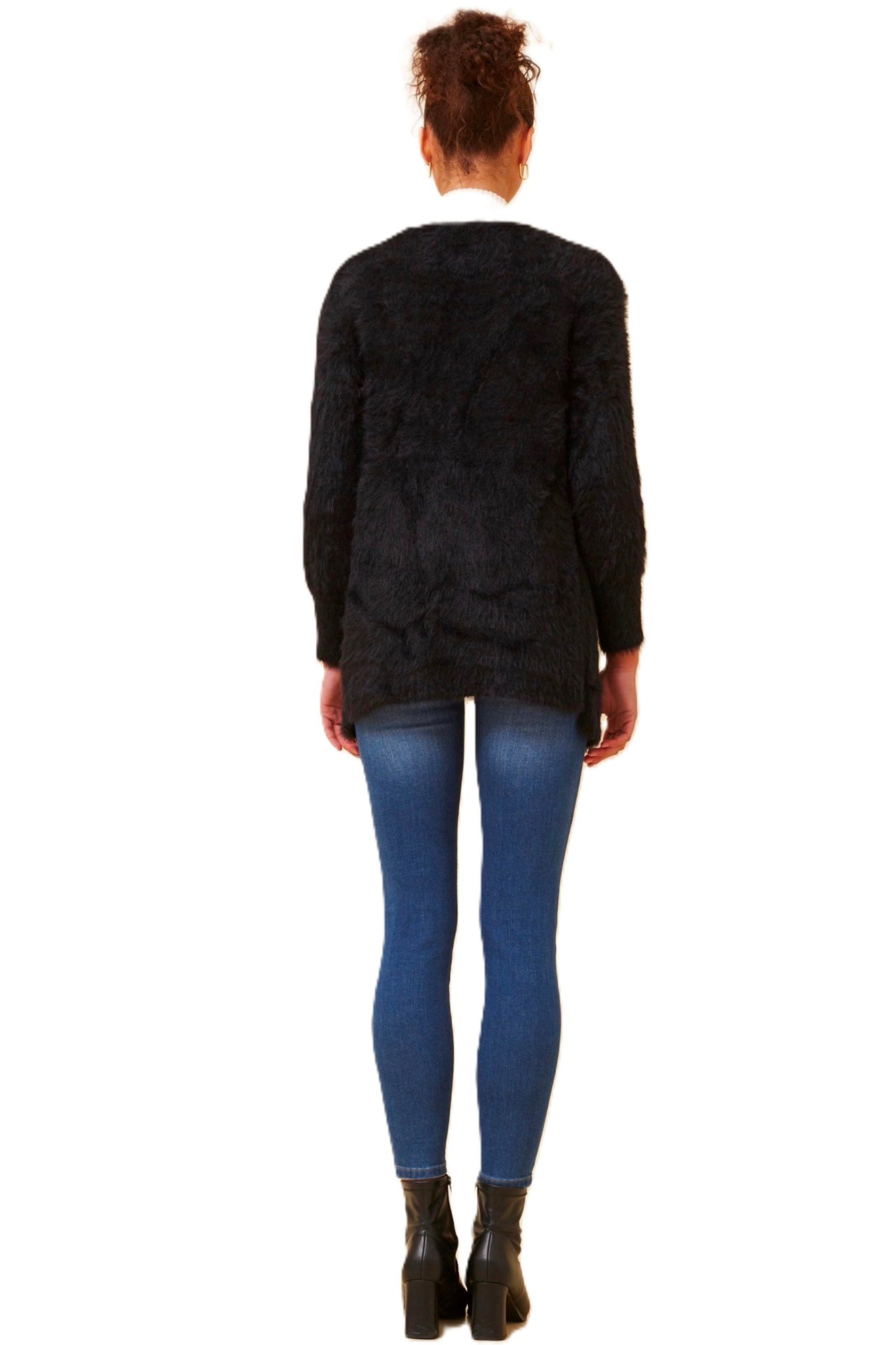 The Leeza Cardigan in Black effortlessly combines comfort and style with its soft eyelash yarn and is ideal for easy transeasonal styling. Pair it with your favorite jeans and a basic tee for a trendy day look, or belt it over a dress for an effortless transition from day to night. Cleveland Markets It's All About You Boutique Brisbane Fashion