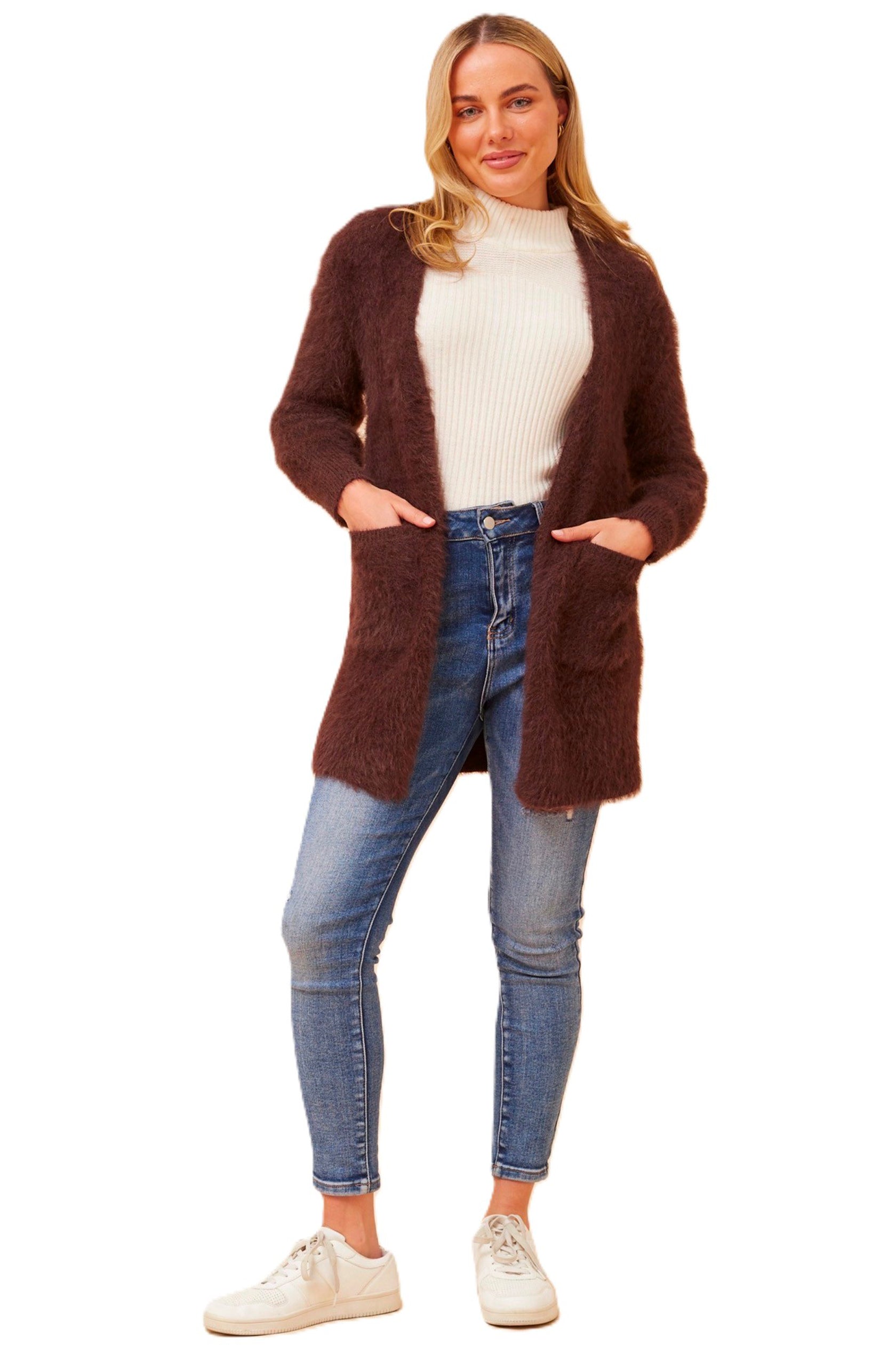 The Leeza Brown Cardigan effortlessly combines comfort and style with its soft eyelash yarn and is ideal for easy transeasonal styling. Pair it with your favorite jeans and a basic tee for a trendy day look, or belt it over a dress for an effortless transition from day to night. It's All About You Boutique Cleveland Markets Brisbane Fashion Jacket