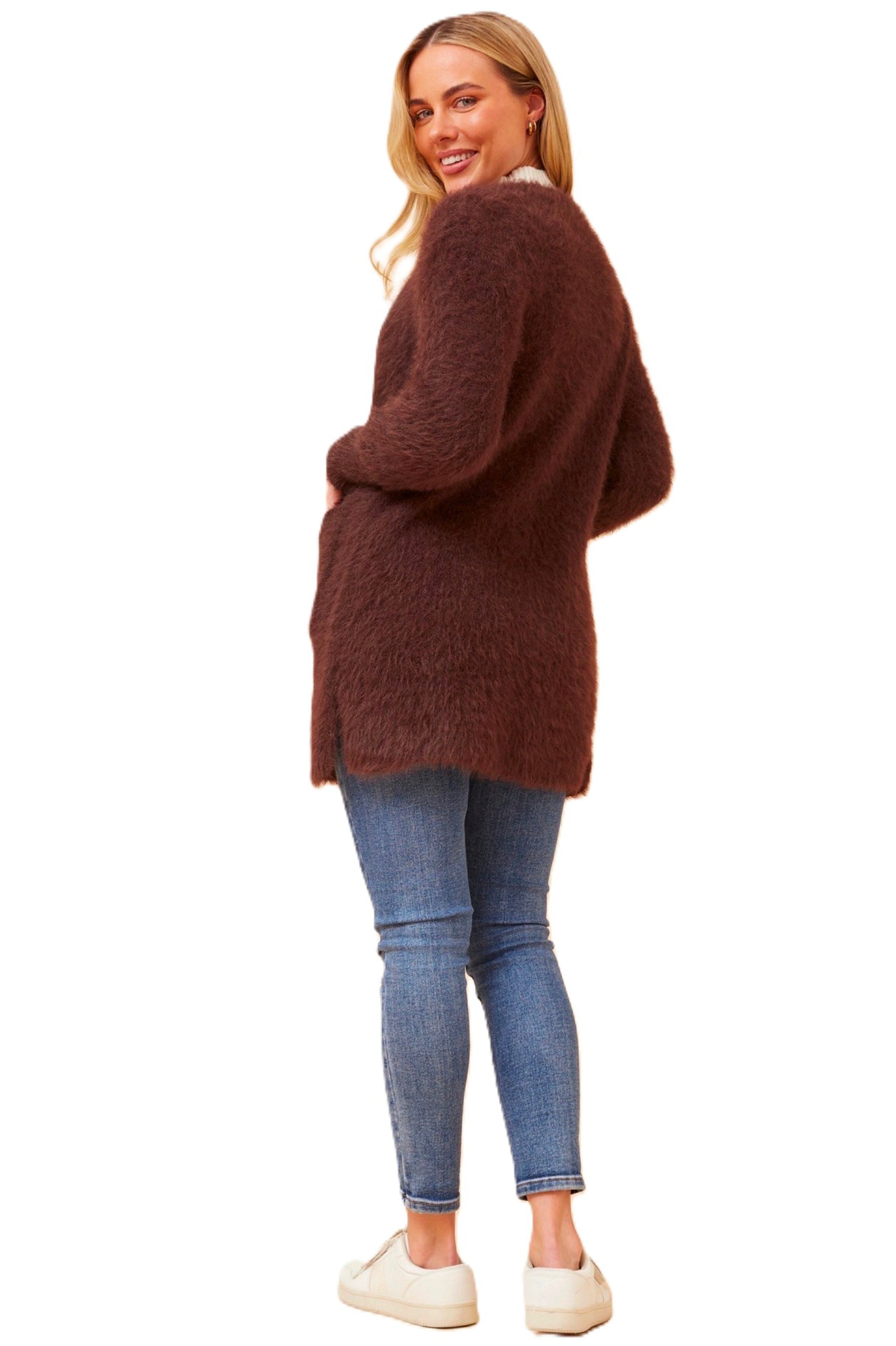 The Leeza Brown Cardigan effortlessly combines comfort and style with its soft eyelash yarn and is ideal for easy transeasonal styling. Pair it with your favorite jeans and a basic tee for a trendy day look, or belt it over a dress for an effortless transition from day to night. It's All About You Boutique Cleveland Markets Brisbane Fashion Jacket