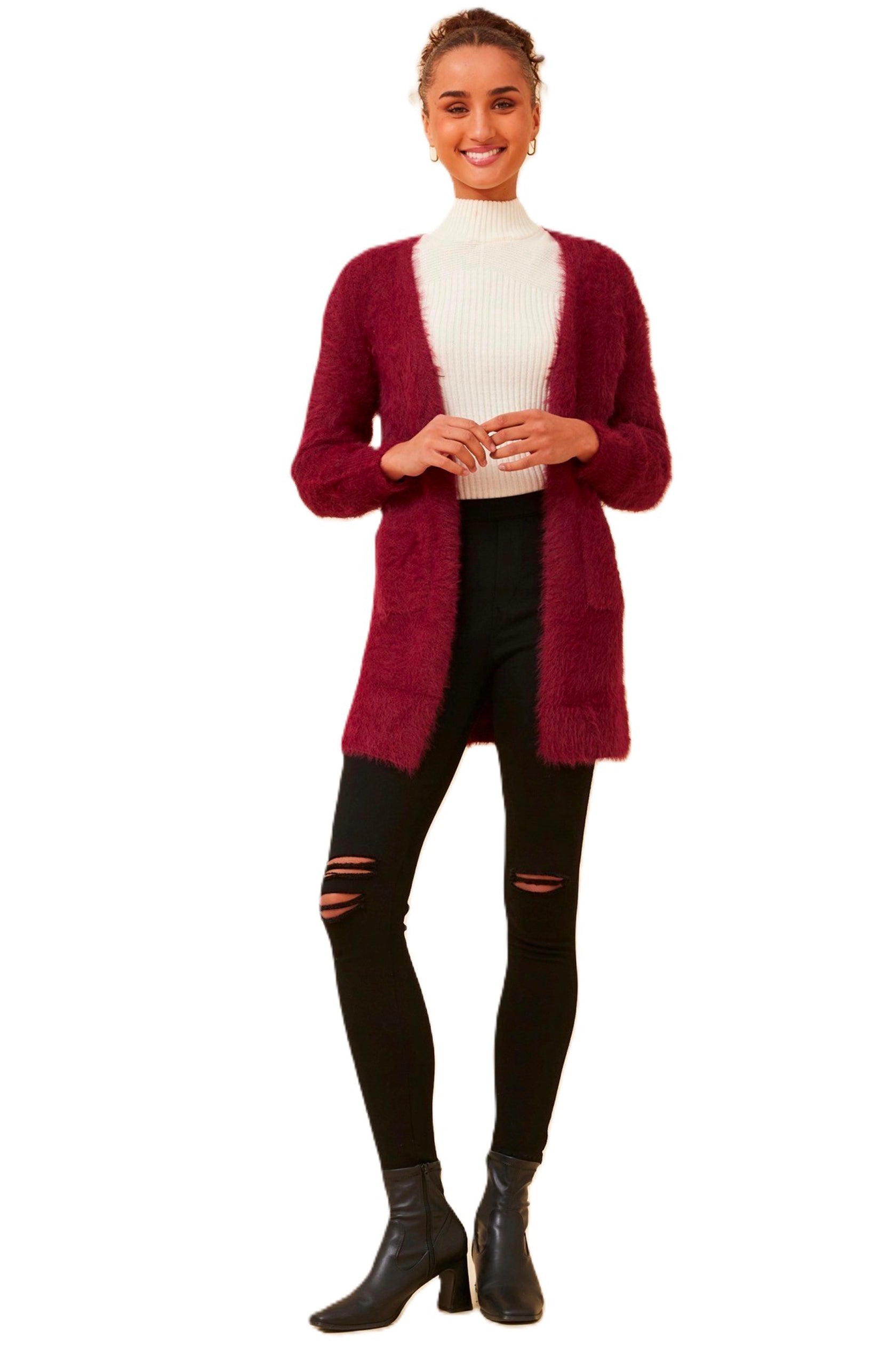 The Leeza Cardigan effortlessly combines comfort and style with its soft eyelash yarn and is ideal for easy transeasonal styling. Pair it with your favorite jeans and a basic tee for a trendy day look, or belt it over a dress for an effortless transition from day to night. Cleveland markets It's All About You Boutique
