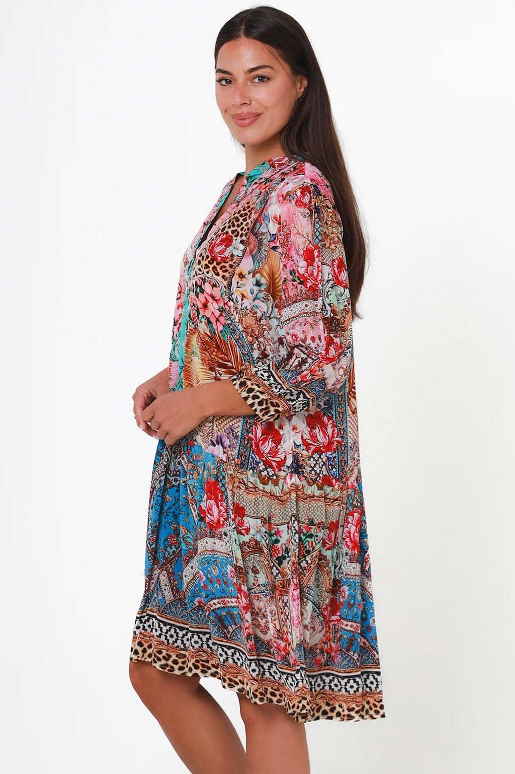 Side view of floral dress with animal print lightweight good for beach feather design flowing mid length dress Cleveland markets Australian business fashion